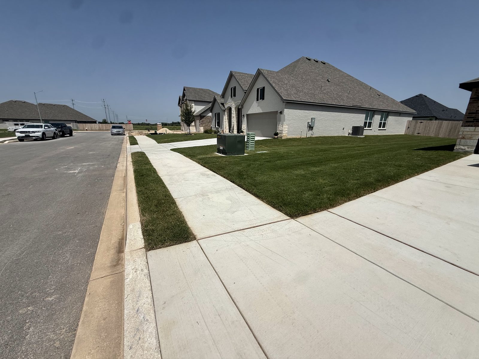 Freshly mowed front lawn by Gonzales Landscaping