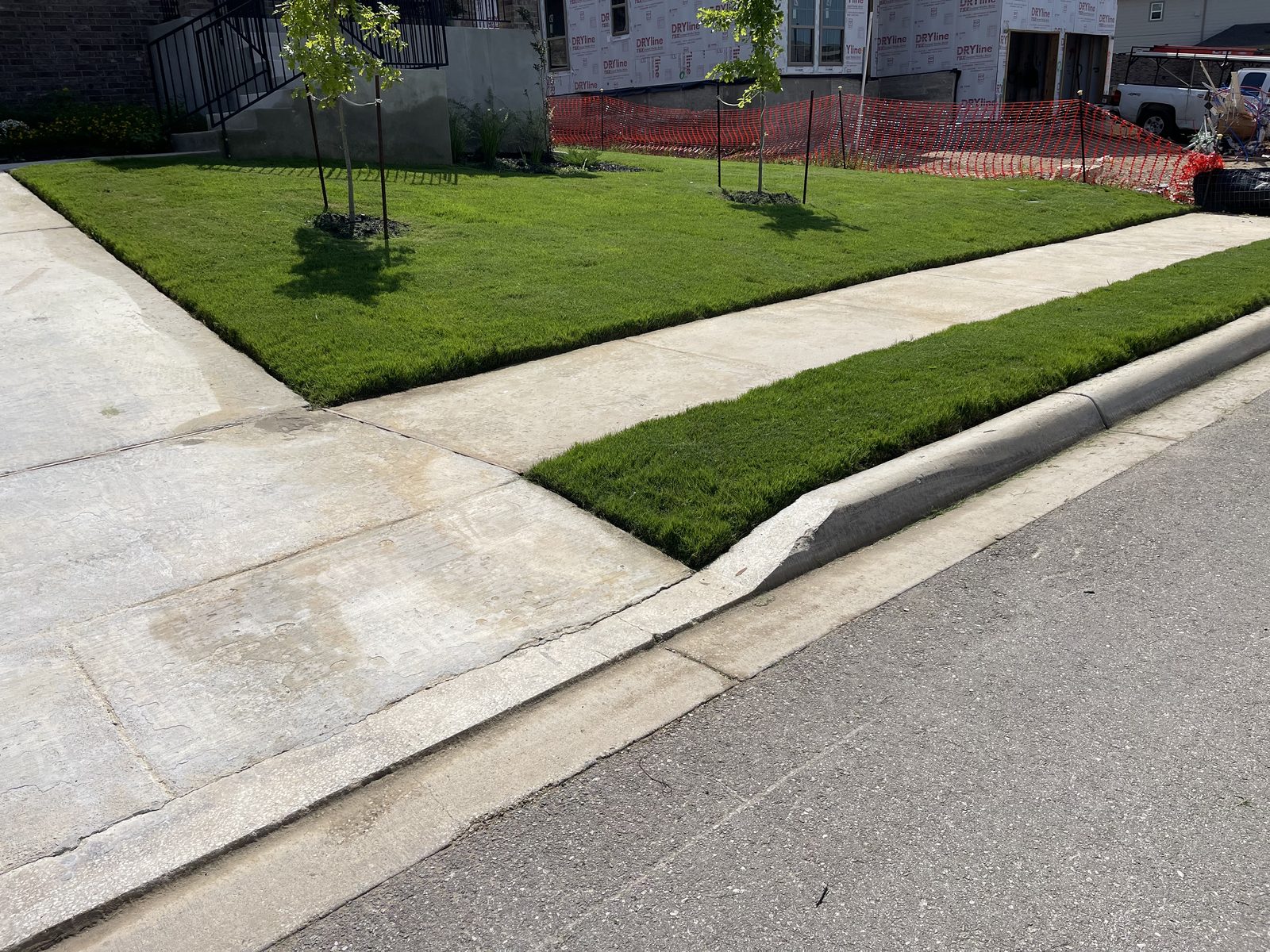 New-construction front yard sod installation in progress in Cibolo, TX by Gonzales Landscaping
